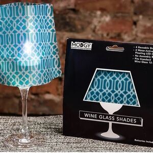 NEW Never opened set of four wine glass shades  and 4 floating LED candles